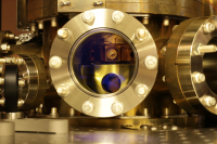 A photo of the atomic clock setup complete with the bisecting cavity. 